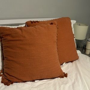 Two burnt orange Target pillows! 24x 24 and lightly used.